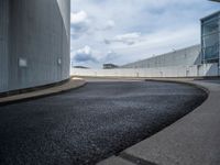 a car is driving on the highway through an underground parking garage area in a city