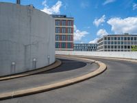 a car is driving on the highway through an underground parking garage area in a city