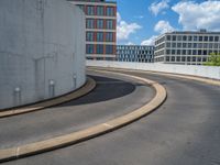 a car is driving on the highway through an underground parking garage area in a city