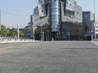 a crosswalk on a city street in a european city with modern architecture on the building