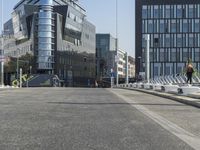 a crosswalk on a city street in a european city with modern architecture on the building