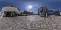 there is a view of the cobblestones in this photo from inside the fisheye lens