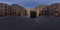 an image of a circular view of buildings with windows on both sides of each side