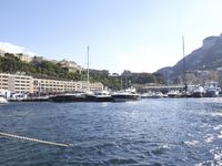 European Coastal Town Cityscape with Mountains and Ocean