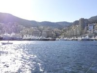 European Coastal Town Cityscape with Mountains and Ocean