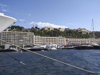 European Coastal Town Cityscape with Mountains and Ocean