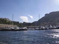European Coastal Town Cityscape with Mountains and Ocean