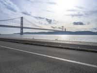 European Coastline: Clear Sky and Bridge in Lisbon