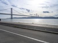 European Coastline: Clear Sky and Bridge in Lisbon