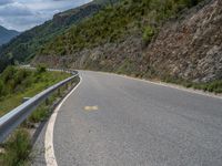 European Countryside: Curved Road Through Mountain Landscape