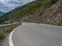 European Countryside: Curved Road Through Mountain Landscape