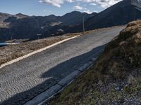 European Highland Road: Clouds and Clear Skies Above