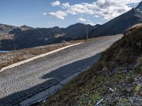 European Highland Road: Clouds and Clear Skies Above