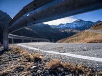 European Highlands: Winding Road and Snow-Capped Mountains