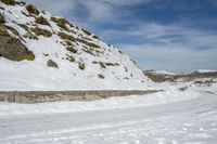 the snow is so deep for a skier to find his way up the hill from