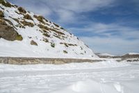 the snow is so deep for a skier to find his way up the hill from