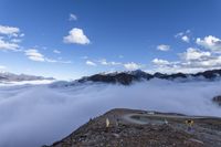 the summit of the mountain is surrounded by fog and clouds during winter in europe or europe