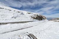 European Road Curves Through Mountain Terrain