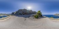 this is an 360 view from a street and a river looking down at the water