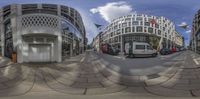 an image of a fish eye lens looking down the street in front of a building