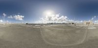 a street is shown through a fish eye lens as it winds up in the wind