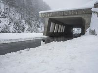 Foggy Winter Road Tunnel Through the Mountains