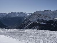 French Alps: Glacial Cliffs and Snowy Views