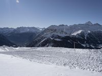 French Alps: Glacial Cliffs and Snowy Views