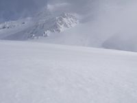 French Alps - Snow Covered Mountains and Glacial Cliff