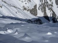 the snow is very smooth and beautiful in this photo by the photographer, and the skier stands in the middle