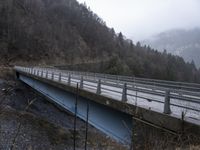 the train has stopped at the high speed on the bridge in the mountains, waiting for someone to take off