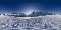 the snow covered mountains are seen in this panoramagraph image in this time lapse photo