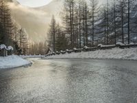 Frozen River Reflection: Snow-Capped Mountains in Germany and Switzerland
