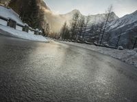 Frozen River Reflection: Snow-Capped Mountains in Germany and Switzerland
