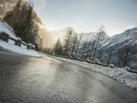 Frozen River Reflection: Snow-Capped Mountains in Germany and Switzerland