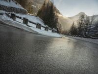 Frozen River Reflection: Snow-Capped Mountains in Germany and Switzerland