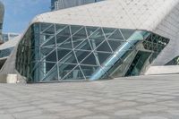 an image of a building that is designed to look like a pyramid with a giant window in it