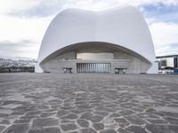 a long open courtyard covered in stone and gray colors of various shapes, sizes and shapes