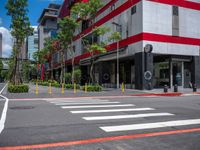 this is an image of a street crossing with buildings in the background of the shot