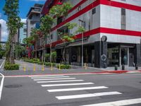 this is an image of a street crossing with buildings in the background of the shot