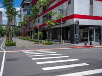 this is an image of a street crossing with buildings in the background of the shot