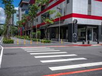 this is an image of a street crossing with buildings in the background of the shot