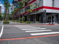 this is an image of a street crossing with buildings in the background of the shot