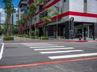 this is an image of a street crossing with buildings in the background of the shot