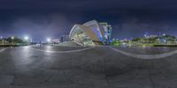 a fish eye shot of the exterior of an art center in chicago at night as seen from a fish eye view point