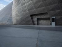 Futuristic Building on a Concrete Street