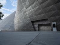 Futuristic Building on a Concrete Street