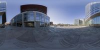 three views of a circular city view in a mirror lens on the street and some buildings