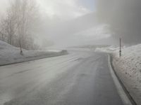 Snow Covered Road in the German Alps: A Winter Scene