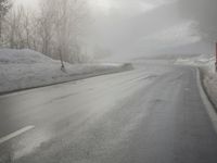 Snow Covered Road in the German Alps: A Winter Scene